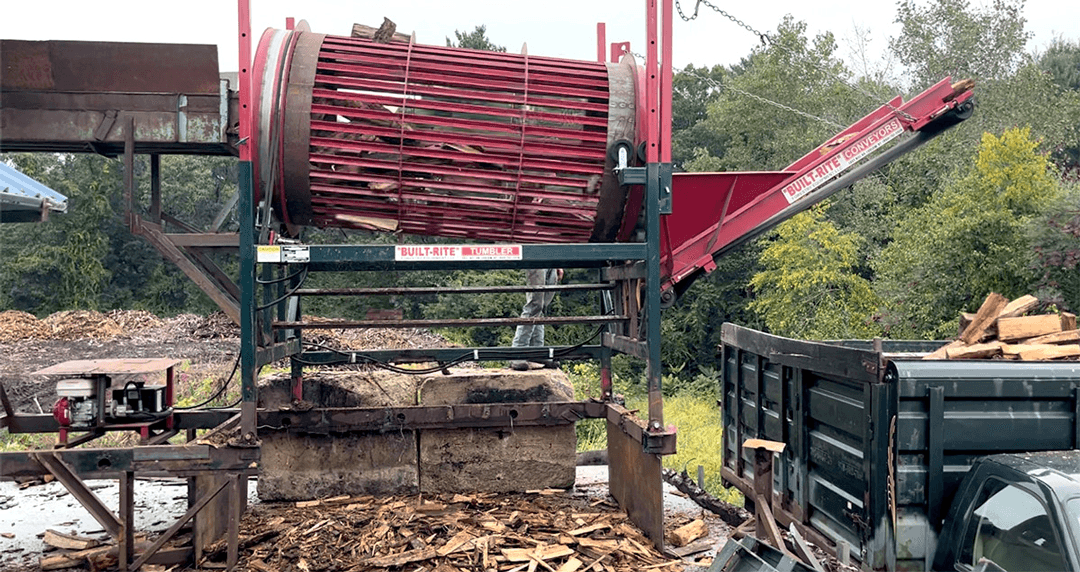 West End Firewood wood tumbler to remove most bark and fragments.